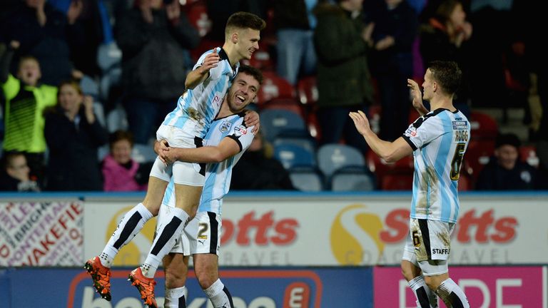 Jamie Paterson of Huddersfield Town celebrates with Tommy Smith
