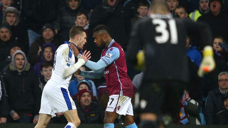 Jamie Vardy of Leicester City and Leandro Bacuna of Aston Villa square off 