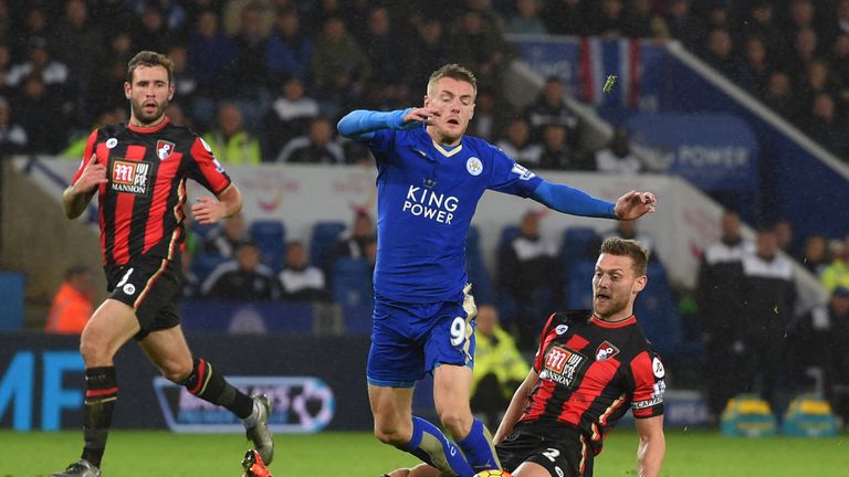 Leicester's Jamie Vardy is fouled by Simon Francis of Bournemouth resulting in a penalty and a red card for Francis