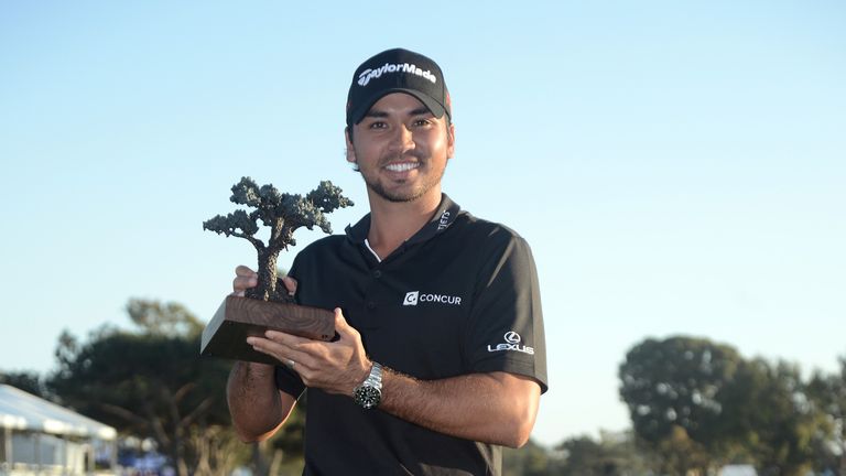 LA JOLLA, CA - FEBRUARY 08:  Jason Day poses with the championship trophy after his victory at the Farmers Insurance Open at Torrey Pines South on February