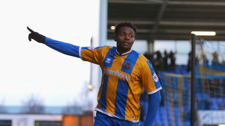 Jean-Louis Akpa Akpro of Shrewsbury Town celebrates scoring his team's first goal during the Emirates FA Cup Fourth Round match against Sheffield Wednesday