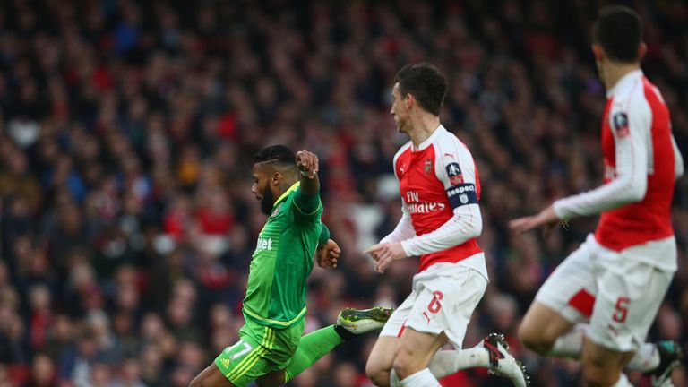 Jeremain Lens scores against Arsenal in the FA Cup