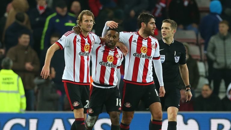 SUNDERLAND, ENGLAND - JANUARY 02:  Jermain Defoe of Sunderland celebrates his second goal with Ola Toivonen and Danny Graham during the Barclays Premier Le