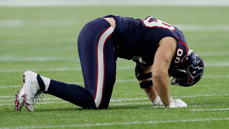 Houston talisman J.J. Watt goes down injured in the second-half