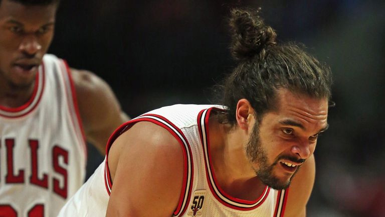 Joakim Noah #13 of the Chicago Bulls reacts after hitting the floor hard against the Washington Wizards