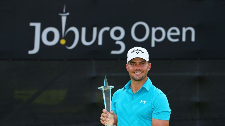 Haydn Porteous poses with the Joburg Open trophy 