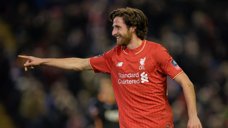 Liverpool midfielder Joe Allen celebrates after scoring the opening goal against Exeter in the FA Cup third round replay
