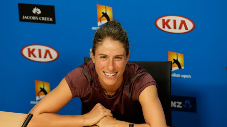 Johanna Konta of Great Britain talks to the media after her semi final match against Angelique Kerber