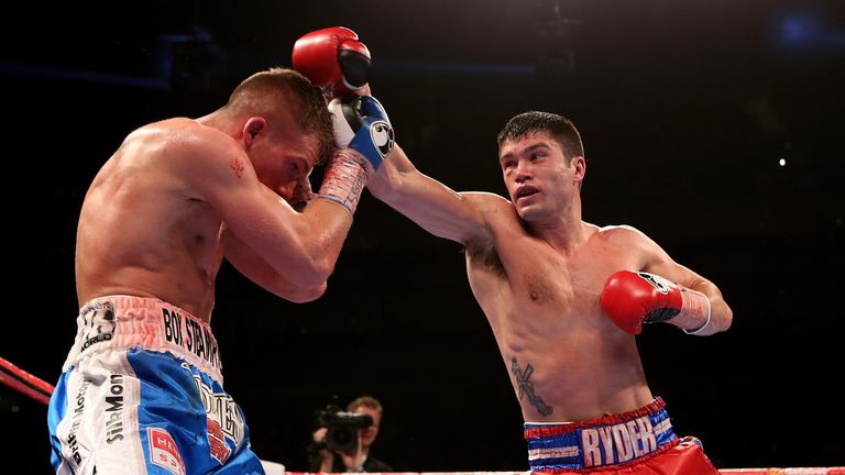 John Ryder of England lands a punch on Nick Blackwell of England during their British Middleweight Championship fight at The O2 