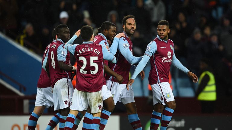 Joleon Lescott of Aston Villa (2R) celebrates with team mates as he scores their first goal with a header against Crystal Palace to make it 1-0