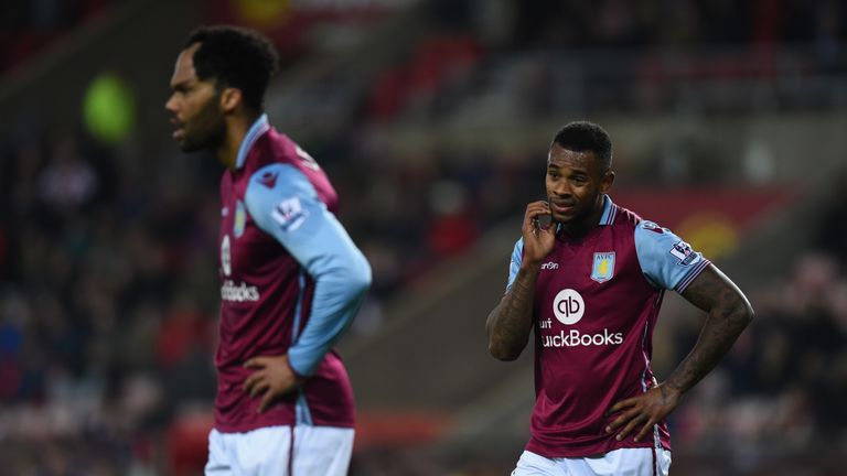 Aston Villa players Joleon Lescott (L) and Leandro Bacuna react during the Barclays Premier League defeat to Sunderland