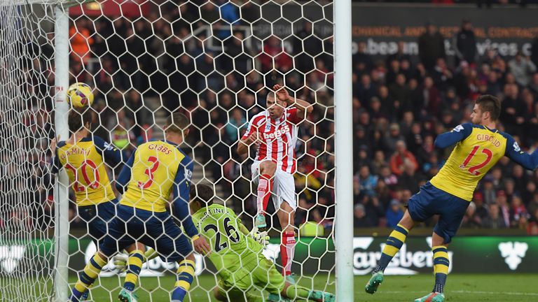 Jon Walters scores for Stoke during a 3-2 win over Arsenal that led to Arsene Wenger being harangued by his own club's supporters