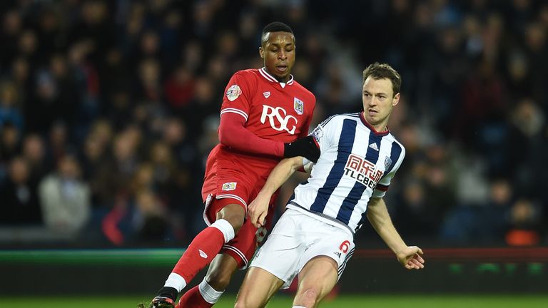 Bristol City's Jonathan Kodjia challenges West Bromwich Albion's Jonny Evans during the Emirates FA Cup, third round game at The Hawthorns, West Bromwich.