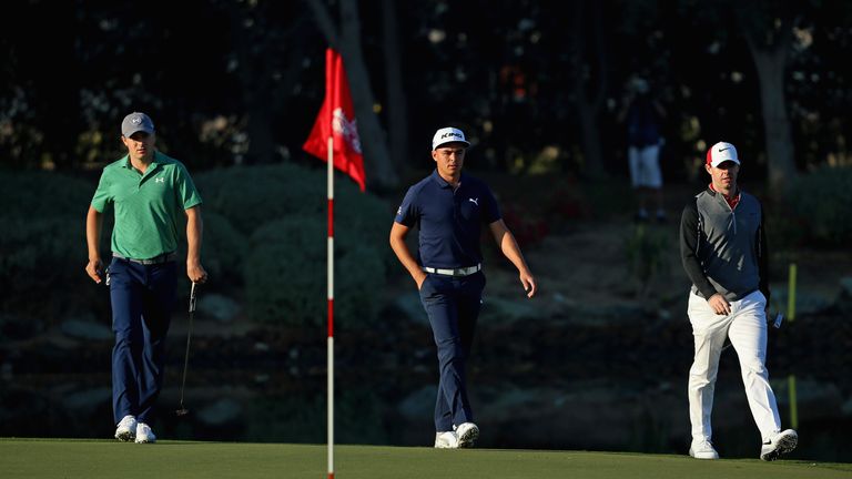 ABU DHABI, UNITED ARAB EMIRATES - JANUARY 21:  (L-R) Jordan Spieth of the USA, Rickie Fowler of the USA and Rory McIlroy of Northern Ireland walk onto the 