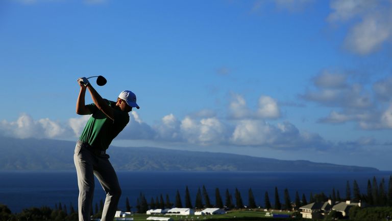 Jordan Spieth plays his shot from the 18th tee during round one of the Hyundai Tournament of Champions at the Plantation Course at Kapalua Golf Club