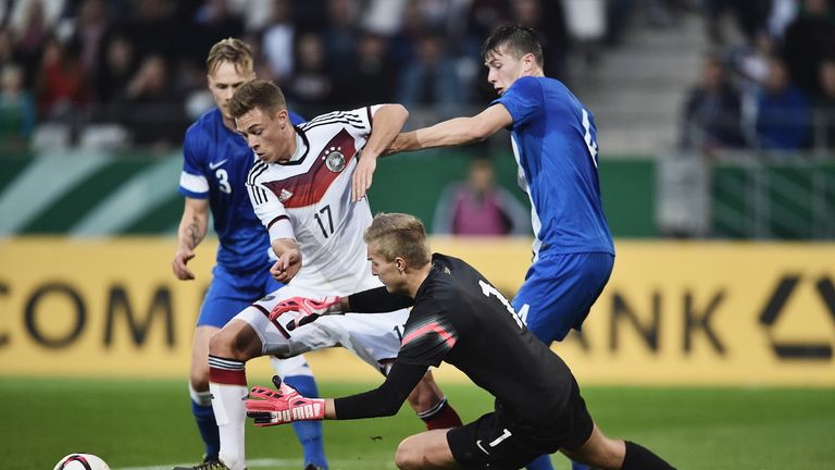 Joshua Kimmich of Germany U21 is challenged by Otso Virtanen of Finland U21