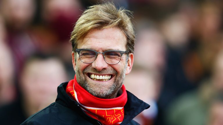 Liverpool manager Jurgen Klopp smiles on the touchline