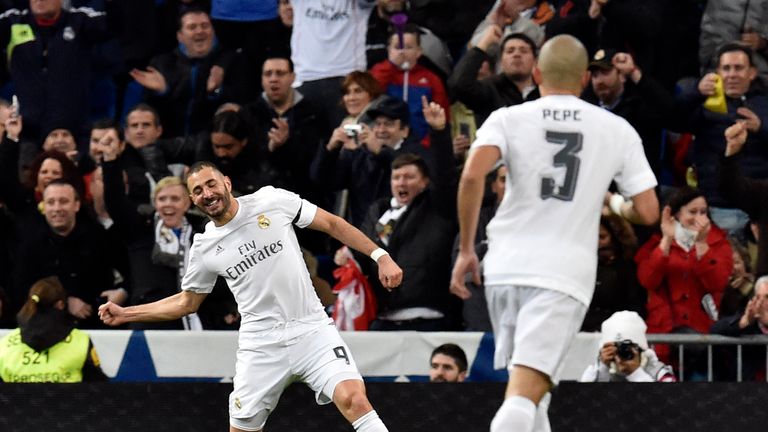 Karim Benzema (left) celebrates after scoring Real Madrid's first goal