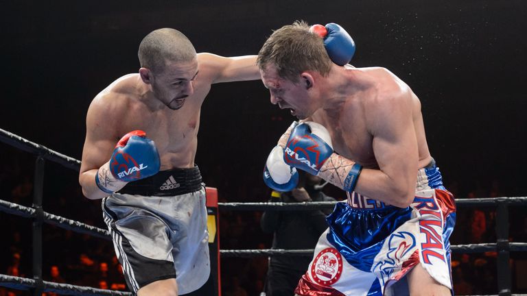 Fouad El Massoudi punches Kevin Bizier during the super welterweight bout at Pepsi Coliseum on April 4, 2015 in Quebec City, Q