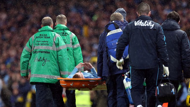 Manchester City's Kevin De Bruyne leaves the pitch injured on a stretcher during the Capital One Cup, semi final, second leg at the Etihad Stadium