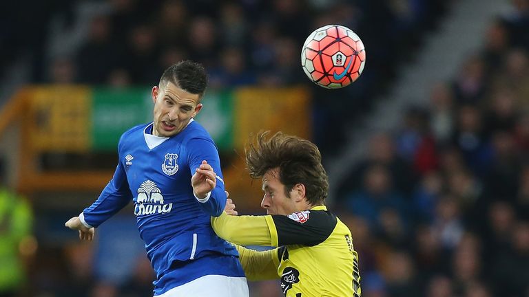 LIVERPOOL, ENGLAND - JANUARY 09: Kevin Mirallas of Everton and Frankie Raymond of Dagenham and Redbridge compete for the ball during the Emirates FA Cup th