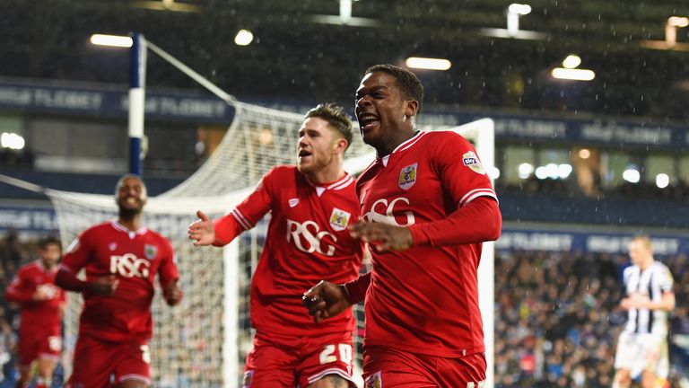 Kieran Agard (R) of Bristol City celebrates scoring his team's second goal against West Brom