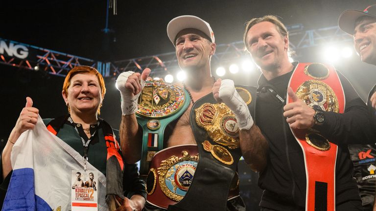 Sergey Kovalev with the WBO, WBA and IBF belts