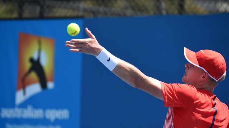 Britain's Kyle Edmund serves during his men's singles match against Bosnia's Damir Dzumhur