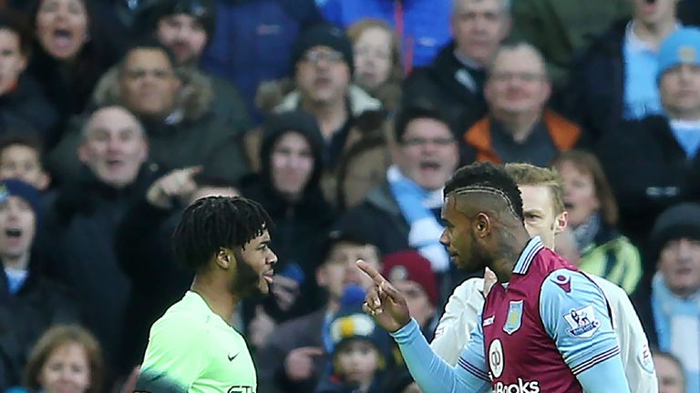 Manchester City midfielder Raheem Sterling (L) and Aston Villa's Leandro Bacuna exchange words during the FA Cup fourth round match