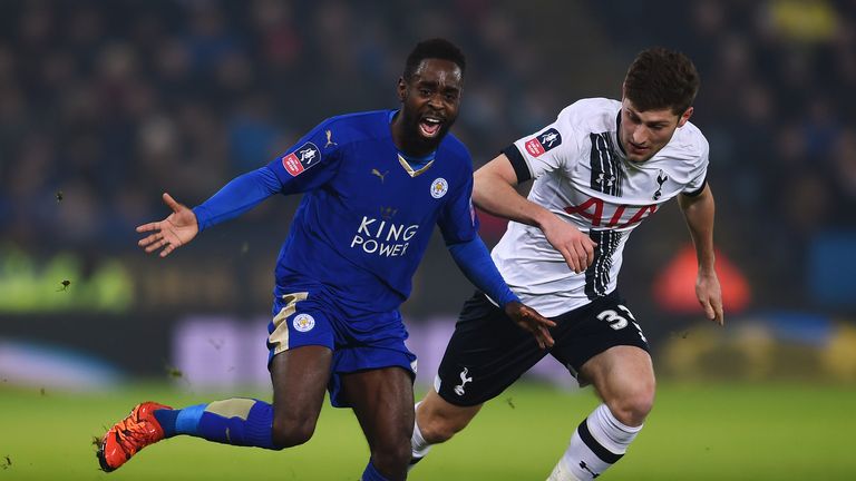 Nathan Dyer is pulled back by Ben Davies