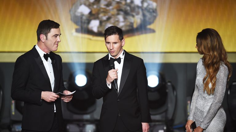 Lionel Messi of Argentina and FC Barcelona is interviewed by hosts, James Nesbitt and Katie Abdo during the FIFA Ballon d'Or Gala