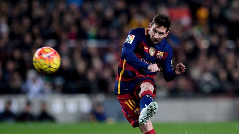Lionel Messi takes a free kick