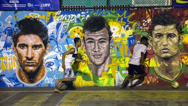 Lionel Messi (L), Brazil's player Neymar da Silva Santos Junior (C) and Portugal's player Cristiano Ronaldo