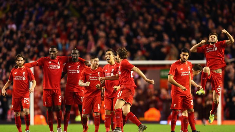 Liverpool celebrate after securing their date at Wembley in March