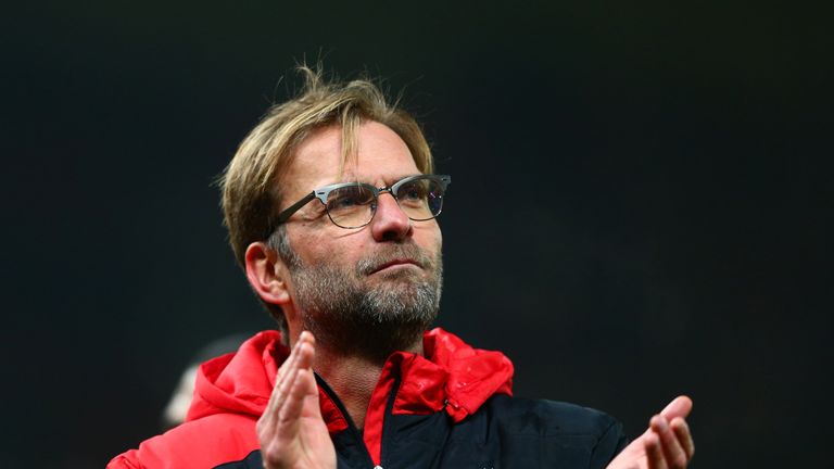 Jurgen Klopp the Manager of Liverpool applauds the fans following their team's 1-0 victory during the Capital One Cup semi-final at Stoke