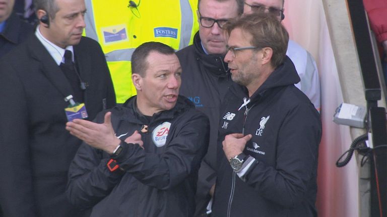 Jurgen Klopp speaks to fourth official Kevin Friend when five minutes of extra time is awarded