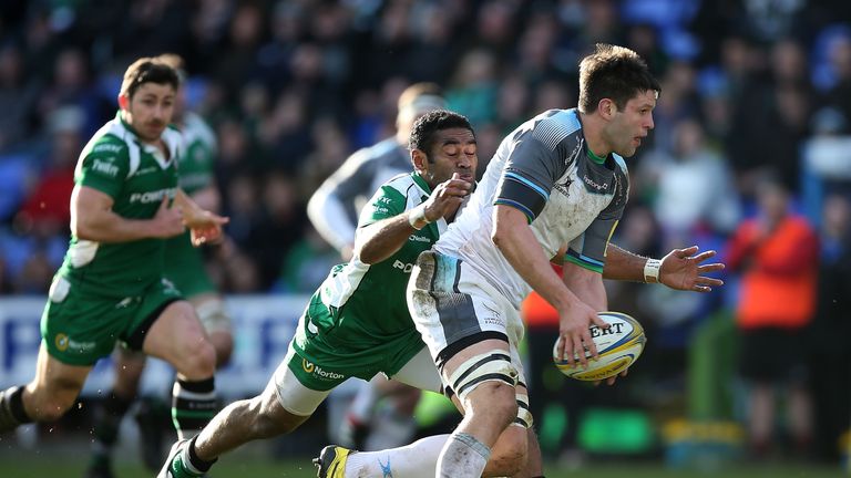 Ally Hogg of Newcastle is tackled by Aseli Tikoirotuma of London Irish