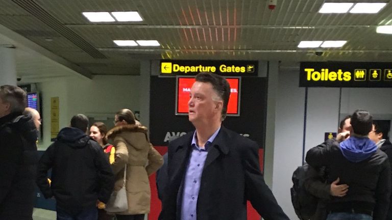 Manchester United manager Louis van Gaal has photographed at Manchester airport on Sunday afternoon