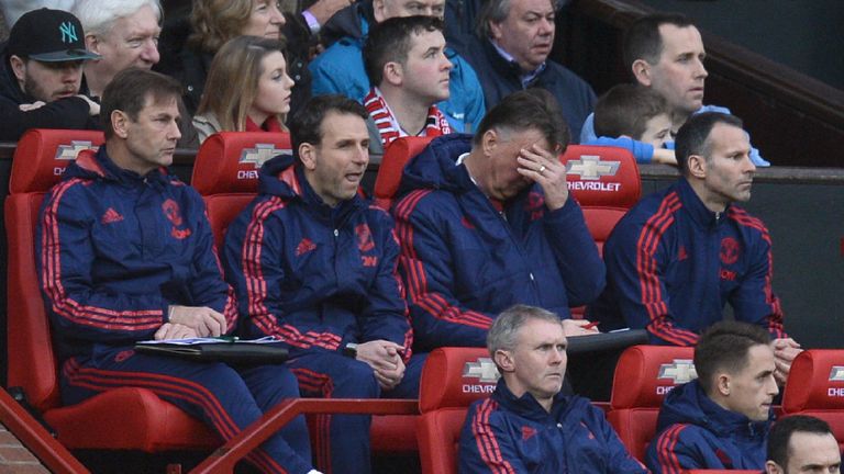 Louis van Gaal covers his eyes during a low-key first half of Manchester United's game against Southampton