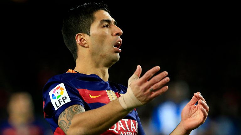 Barcelona's Uruguayan forward Luis Suarez reacts after missing a chance