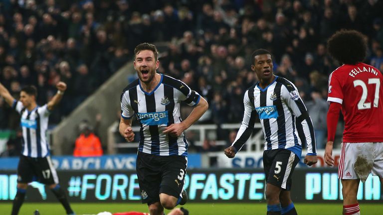 Paul Dummett celebrates after scoring a late equaliser to make it 3-3 against Manchester United