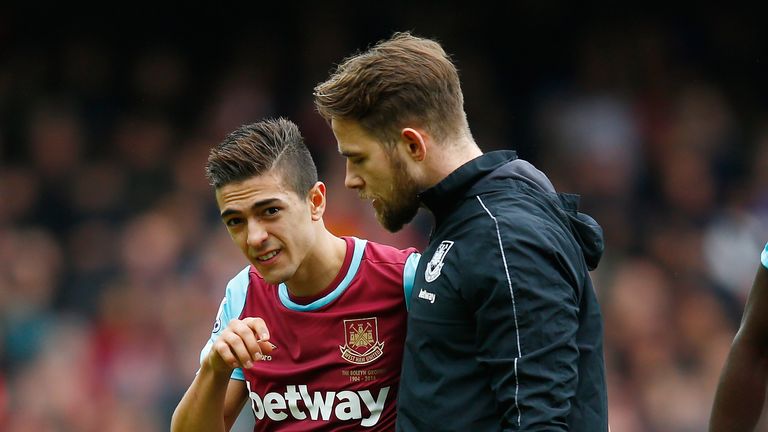 Manuel Lanzini limps off against Liverpool