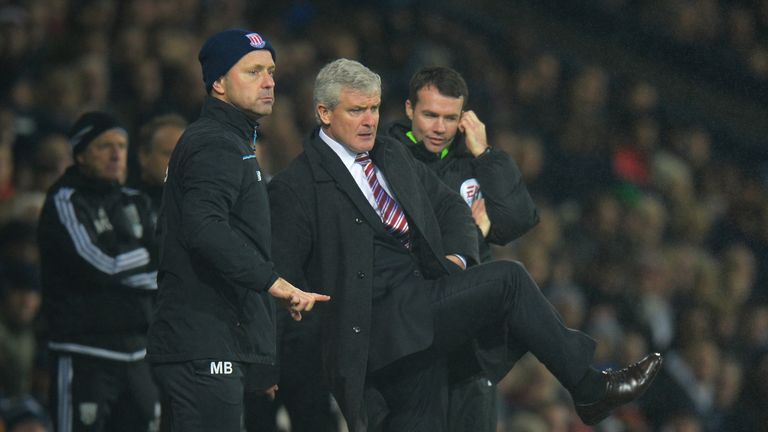 Mark Hughes manager of Stoke City gestures during the Barclays Premier League match between West Bromwich Albion and Stoke City at The Hawthorns