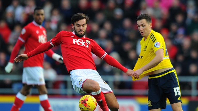 Marlon Pack knocks the ball away from Stewart Downing 