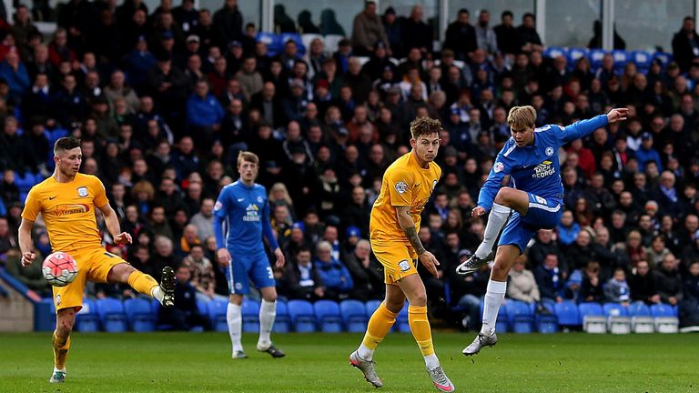 Martin Samuelsen of Peterborough scores the opening goal of the game 