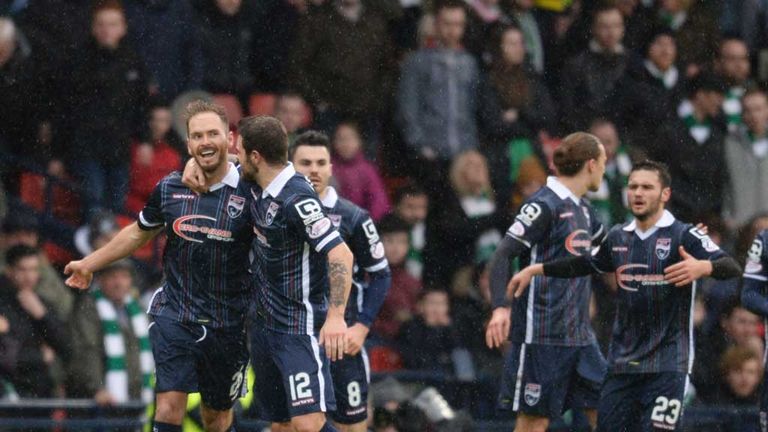 Martin Woods (left) celebrates penalty goal v Celtic in League Cup semi-final