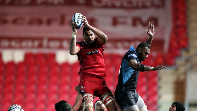 LLANELLI, WALES - DECEMBER 19:  Maselino Paulino of Scarlets wins lineout ball against Glasgow during the European Rugby Champions Cup