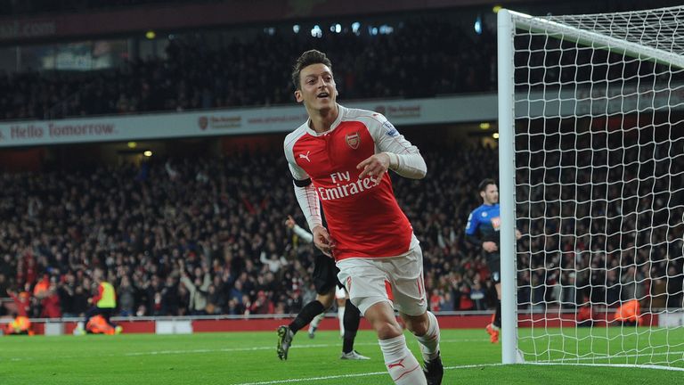  Mesut Ozil celebrates scoring Arsenal's 2nd goal