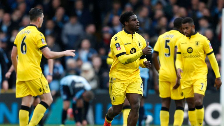 Aston Villa's Micah Richards celebrates scoring his side's first goal of the game during the Emirates FA Cup, third round game at Adams Park, High Wycombe.