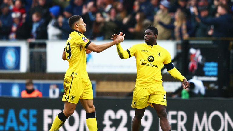 HIGH WYCOMBE, ENGLAND - JANUARY 09: Micah Richards (R) of Aston Villa celebrates scoring his team's first goal with his team mate Rudy Gestede (L) 